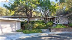 NESTLED INTO THE UPPER ROCKRIDGE HILLS