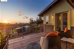GORGEOUS HOME WITH AN OPEN FLOOR PLAN AND SOARING CATHEDRAL CEILINGS