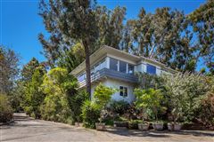 AN IMPECCABLY UPDATED MID-CENTURY JEWEL, WITH EXCEPTIONAL VIEWS FROM EVERY ROOM