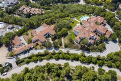 THE ULTIMATE TWO-HOME COMPOUND
