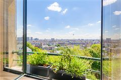 LIGHT FILLED APARTMENT WITH VIEWS