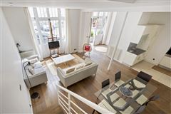BRIGHT AND MODERN TWO STORY APARTMENT