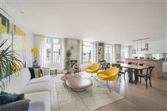 THIS LIGHT-FILLED APARTMENT IS AN IDEAL PIED A TERRE