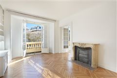 CHARMING APARTMENT IN AN ELEGANT EARLY 20TH CENTURY FREESTONE BUILDING ENJOYS OPEN VIEWS