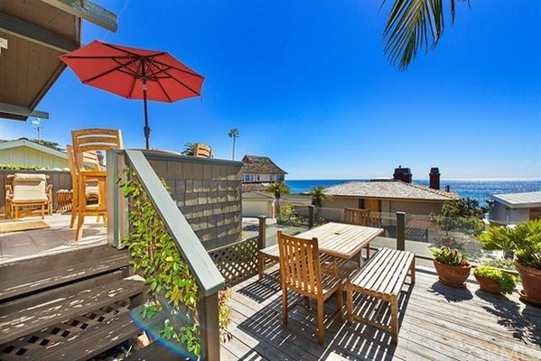 Indulge In The Opulence Of Oceanfront Living In This Charming