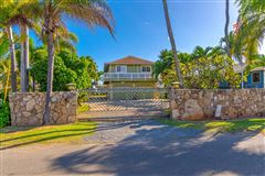 GATED BEACHFRONT PROPERTY WITH TWO HOMES