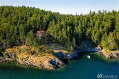 SECLUDED WATERFRONT STONE MANSION
