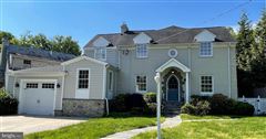 MAGNIFICENT THREE-LEVEL COLONIAL STYLE HOME