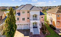 CUSTOM BUILT MODEL HOME IN THE PENINSULA WITH POND AND GOLF COURSE VIEWS