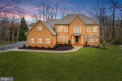 EXCEPTIONAL FIVE BEDROOM BRICK COLONIAL