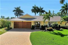 IMPECCABLY MAINTAINED PARK SHORE SINGLE-STORY