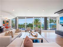REMASTERED BEACHFRONT JEWEL WITHIN BAY COLONY