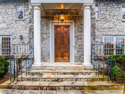 Elegant Home Boasts Three Stone Fireplaces North