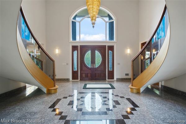This Grand Residence Boasts Dramatic Entry Foyer With Sweeping