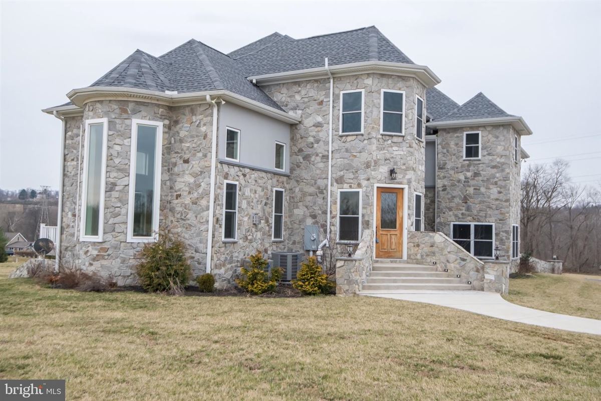 CUSTOM HOME NESTLED ON THREE ACRES IN DERRY TOWNSHIP