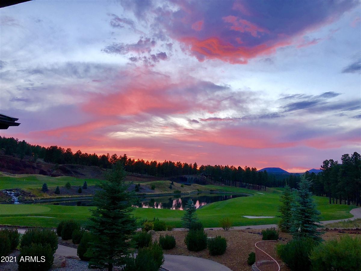 Beautiful Home Surrounded By Lush Landscaping Creating Privacy Mountain And Golf Course Views Arizona Luxury Homes Mansions For Sale Luxury Portfolio