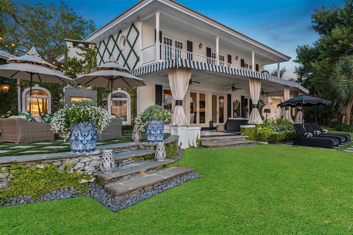 BEAUTIFULLY REMODELED RIVERFRONT FAMILY COMPOUND Florida Luxury Homes