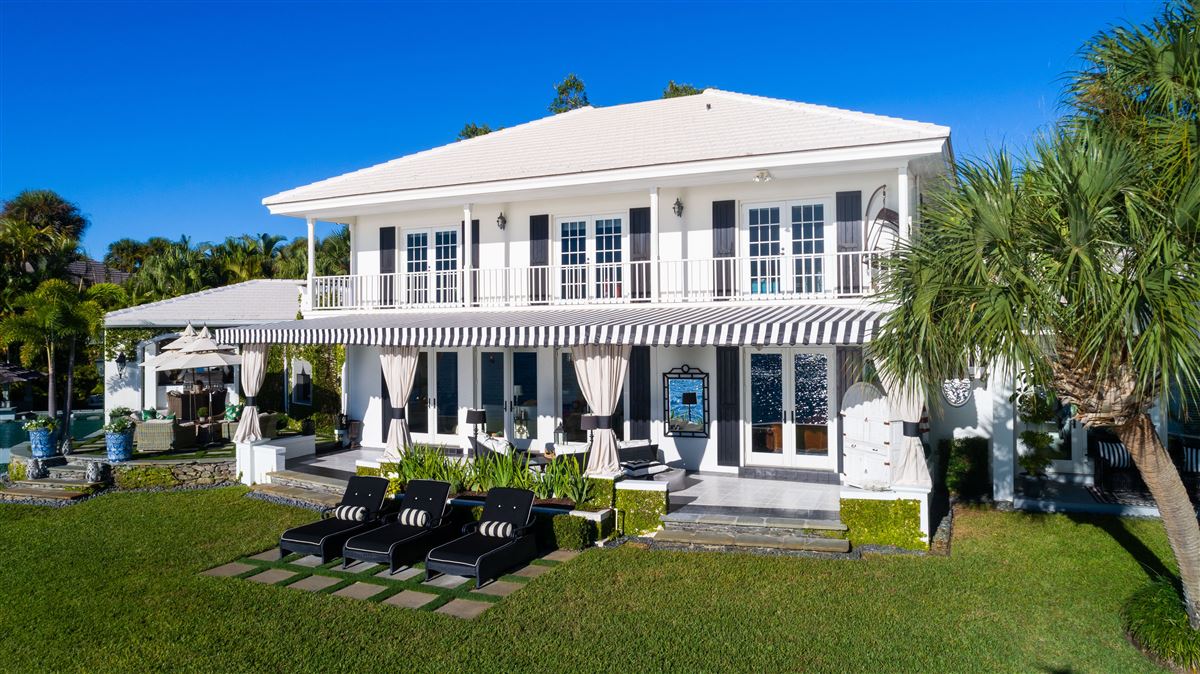 BEAUTIFULLY REMODELED RIVERFRONT FAMILY COMPOUND Florida Luxury Homes
