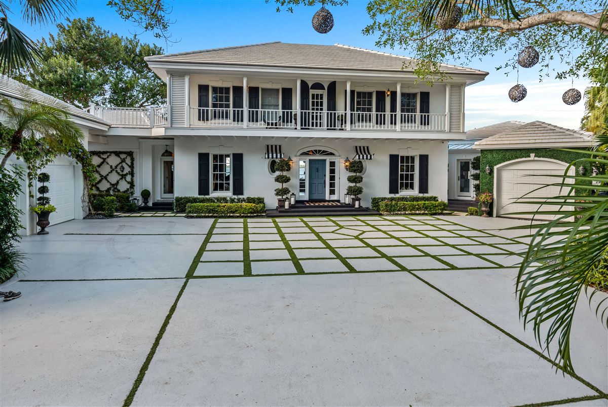 BEAUTIFULLY REMODELED RIVERFRONT FAMILY COMPOUND Florida Luxury Homes