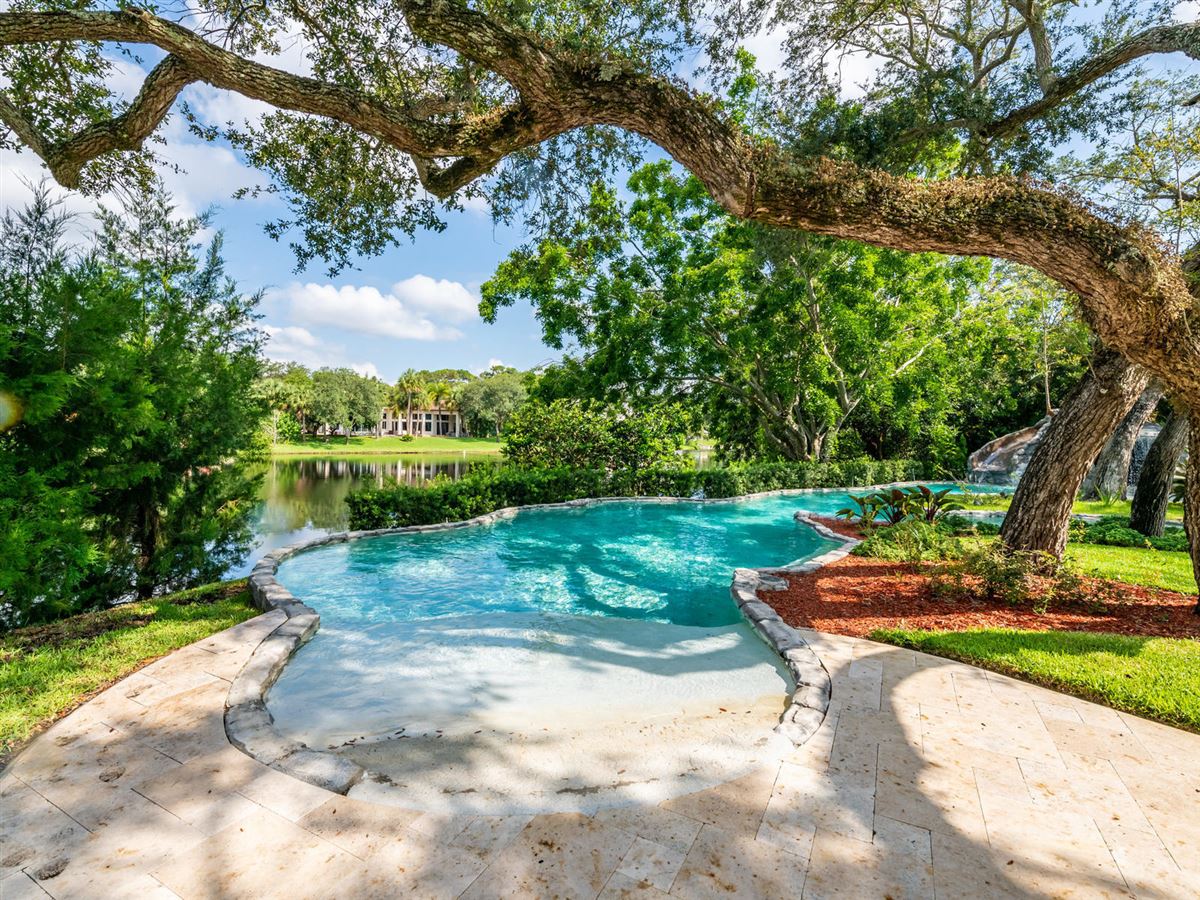 STUNNING CUSTOM LUXURY ESTATE HOME IN FOXE CHASE Florida Luxury Homes