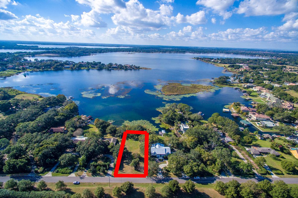 BEAUTIFUL LAKEFRONT LOT ON BUTLER CHAIN OF LAKES Florida Luxury Homes Mansions For Sale