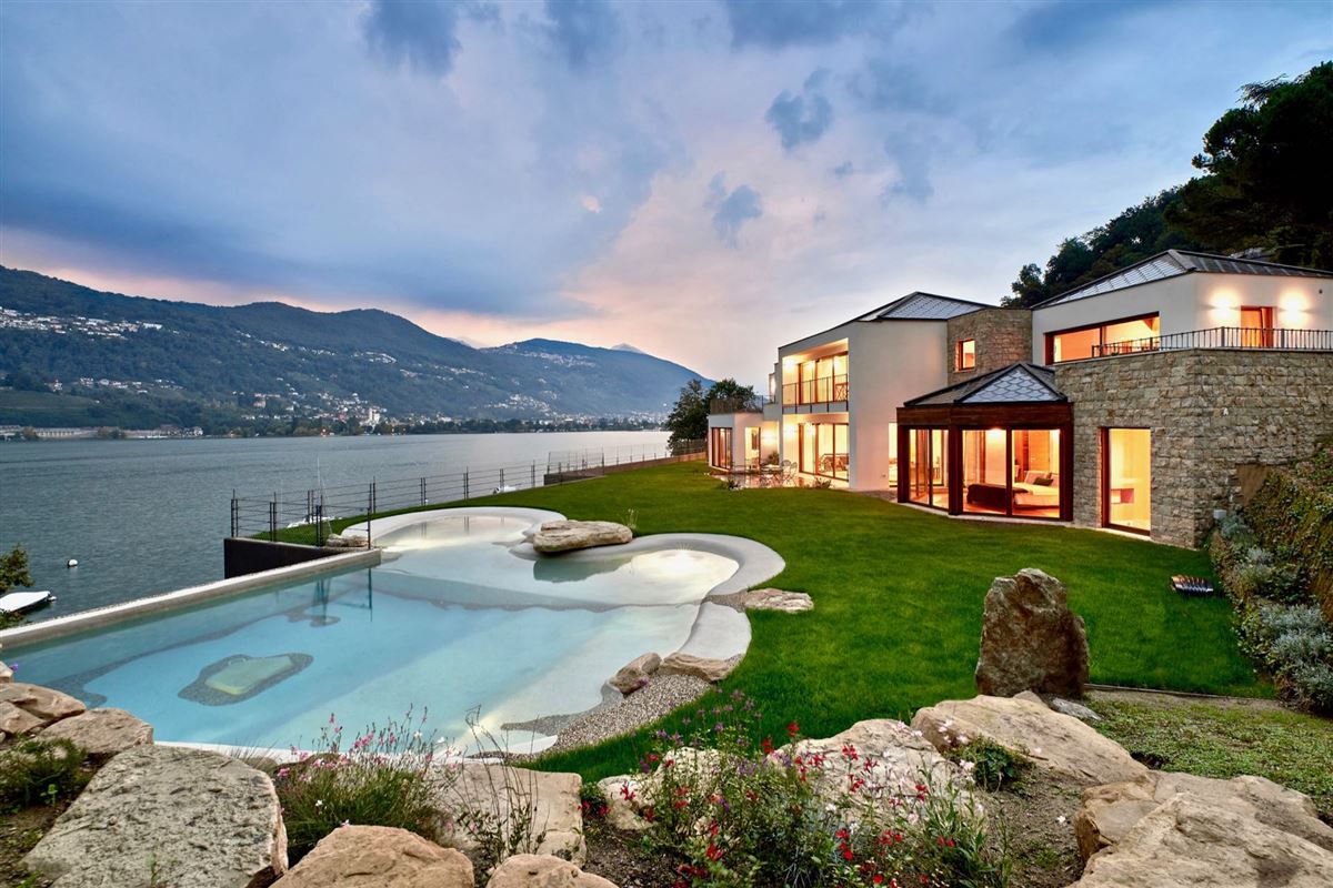 A MAJESTIC LAKE FRONT HOME IN MONTAGNOLA Switzerland Luxury Homes