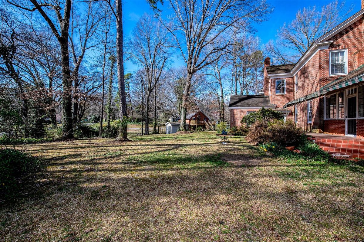 STATELY TRADITIONAL RED BRICK HOME North Carolina Luxury Homes