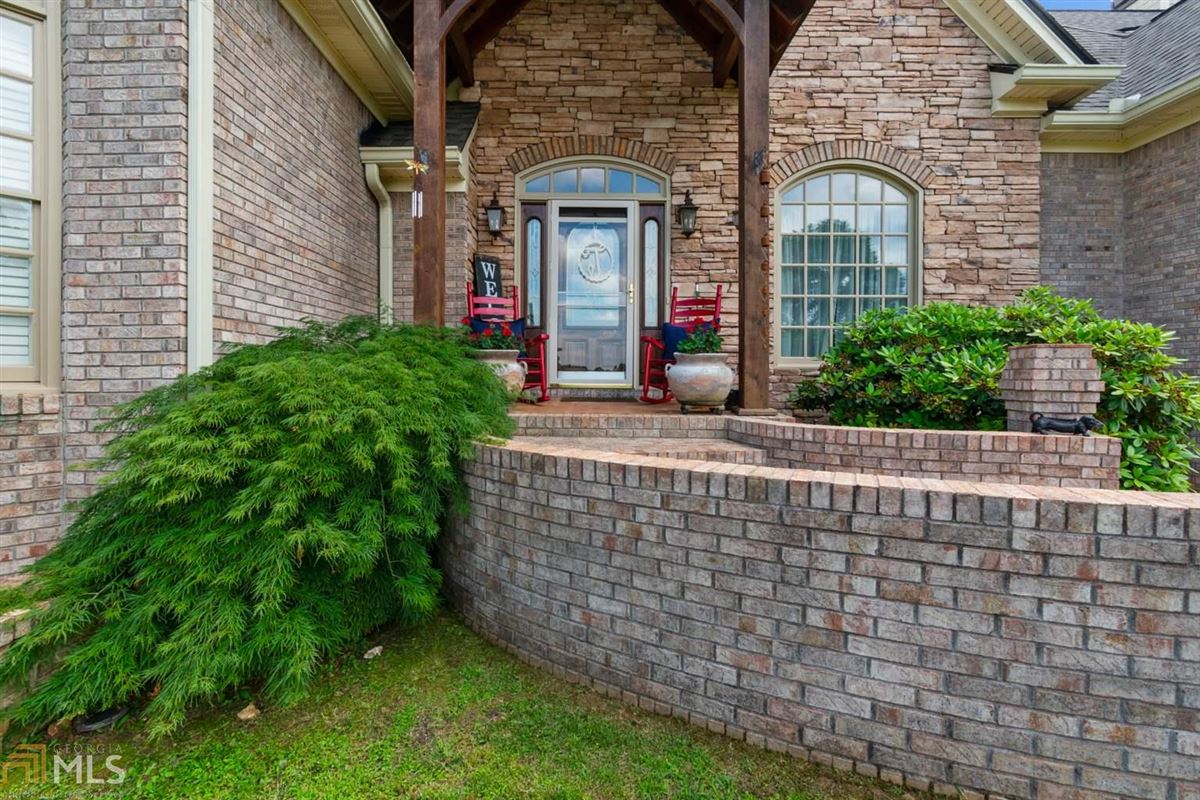 CUSTOM BRICK RANCH HOME WITH EXQUISITE FINISHES Luxury Homes