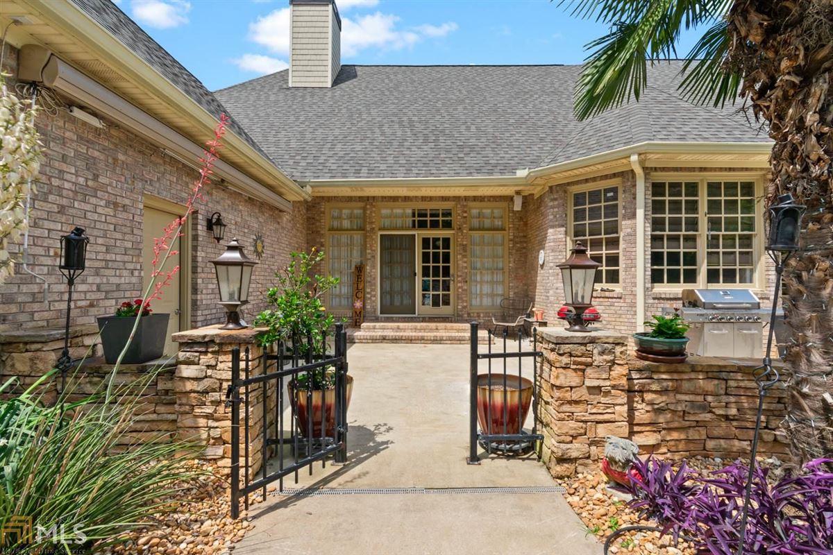 CUSTOM BRICK RANCH HOME WITH EXQUISITE FINISHES Luxury Homes