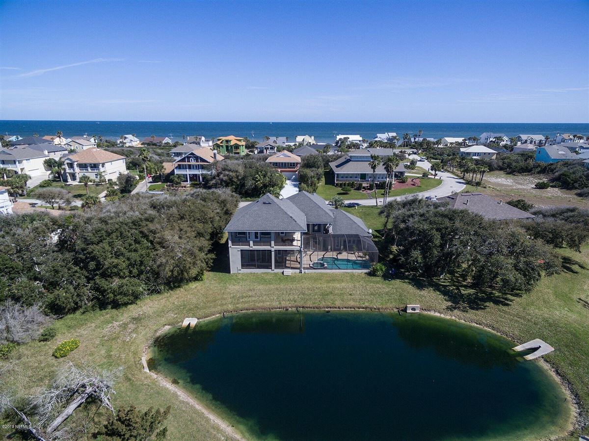 CUSTOM RESIDENCE WITH INTERCOASTAL AND RIVER VIEWS Florida Luxury