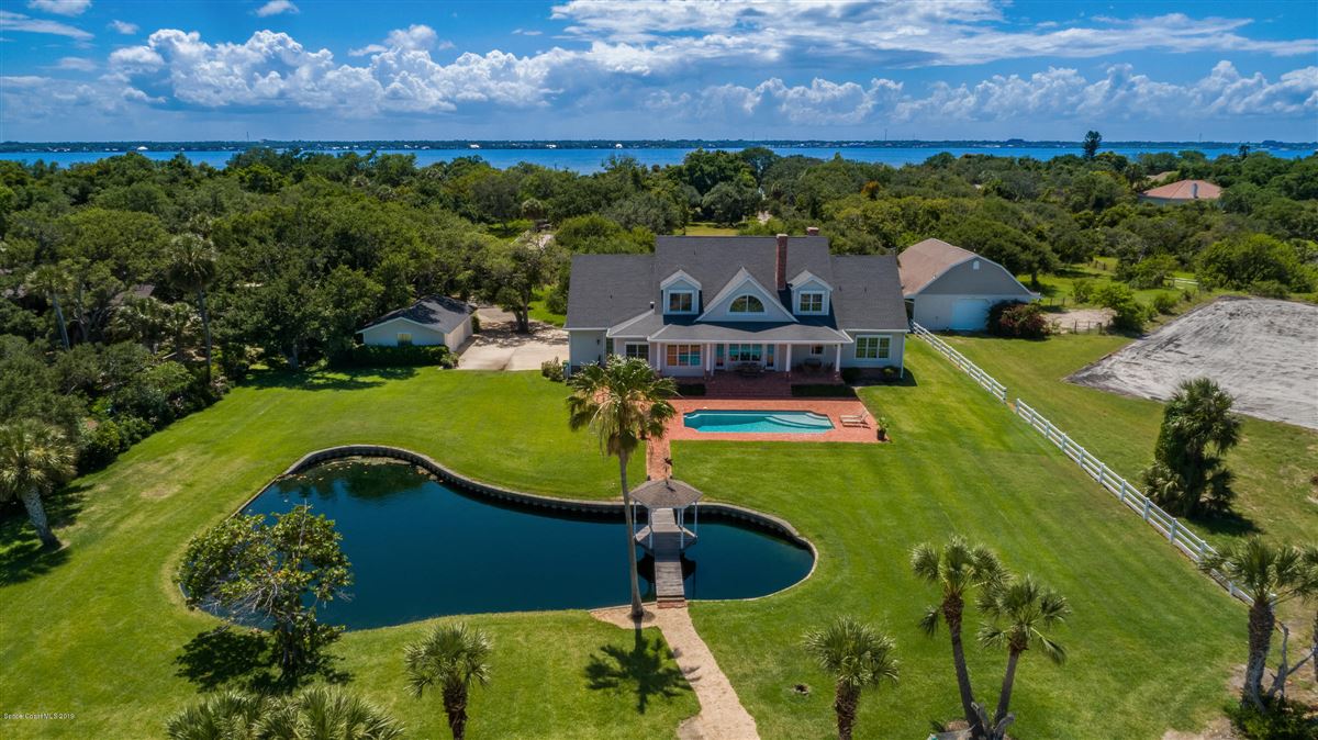 CLASSICALLY ELEGANT RIVER TO RIVER ESTATE ON S TROPICAL TRAIL Florida