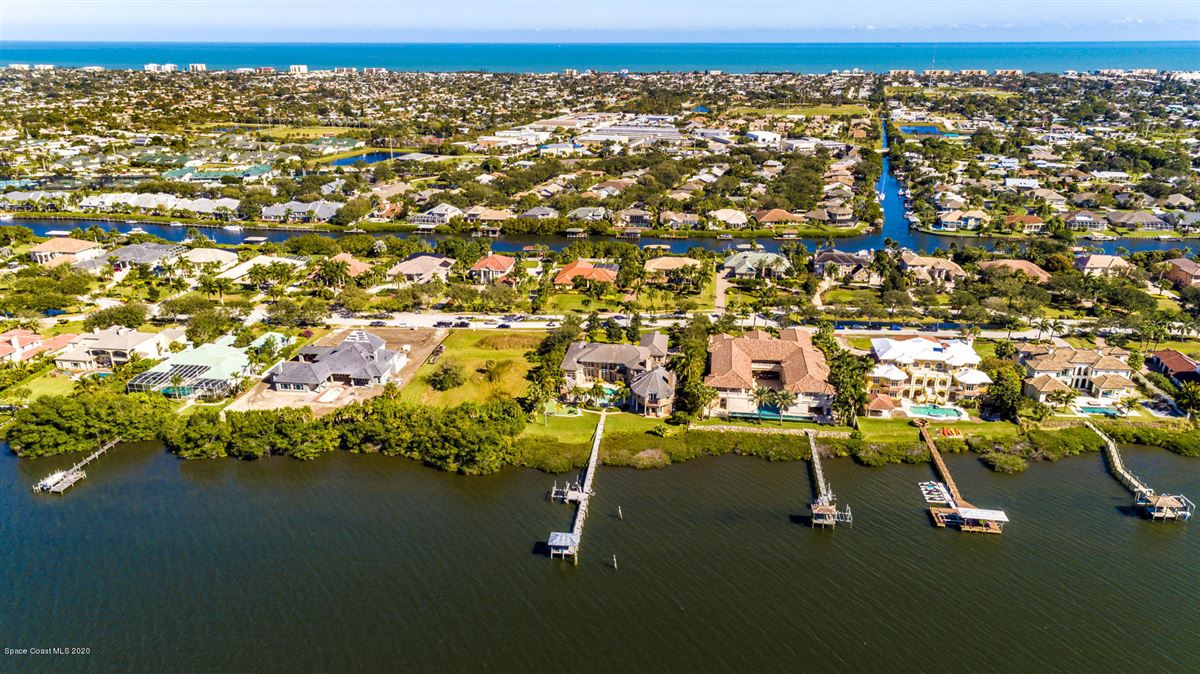 SPECTACULAR ESTATE ON THE BANANA RIVER Florida Luxury Homes