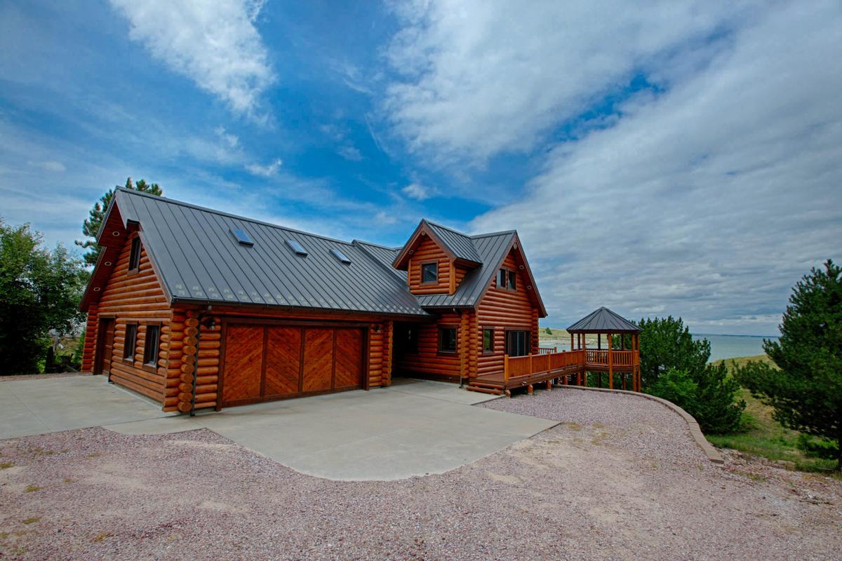 log cabin mansions for sale